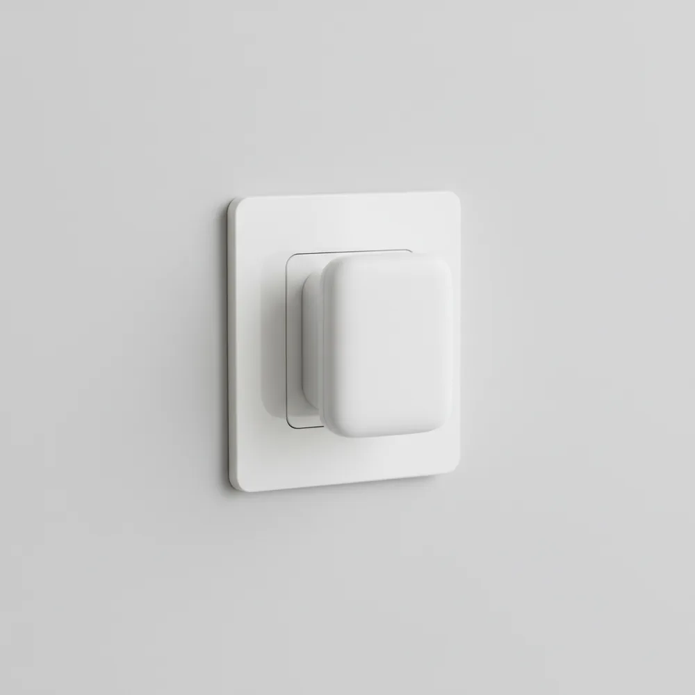 The compact white outlet plug